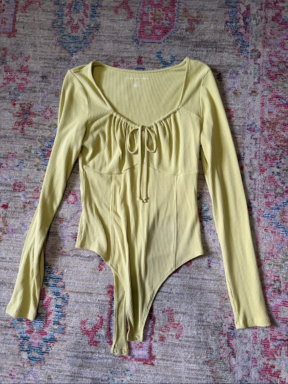 American Eagle Outfitters Ribbed Long Sleeve Bodysuit in Light Yellow